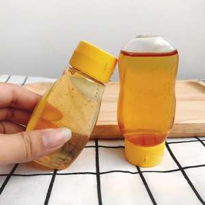 Bouteille de <span class=keywords><strong>miel</strong></span> mini en plastique PET de 72 ml 100 g, pot d'emballage vide, bouteille souple pour <span class=keywords><strong>miel</strong></span>, petit récipient sérigraphié avec bouchon en silicone - Product Image 3
