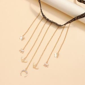Chaîne de corps élastique imprimé léopard avec pampille dorée et pendentifs papillon, éléphant, lune pour femme – Idéale pour la plage - Product Image 3
