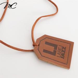 Custom  private logo brown leather label hang tag for handbag luggage jeans hat baseball cap  swing tags patch label - Product Image 5