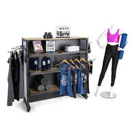 Étagères mobiles de gondole de magasin de vêtements pop moderne personnalisée magasin de vêtements au détail présentoir de t-shirts avec roue