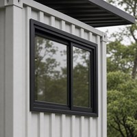 Maison mobile moderne en conteneur avec structure en acier, balcon et espace de vie en verre