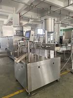 Machine de remplissage et de bouchage de sachets à bec verseur de bureau, pour Doypack, construction métallique, capacité 200 kg, 1150x1100x1870mm, stock disponible