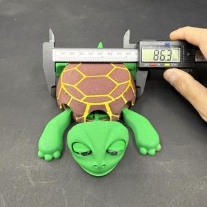 Sous-verre tortue amusant et créatif en plastique, tapis isolant thermique avec membres étonnants et jouet à presser - Product Image 4