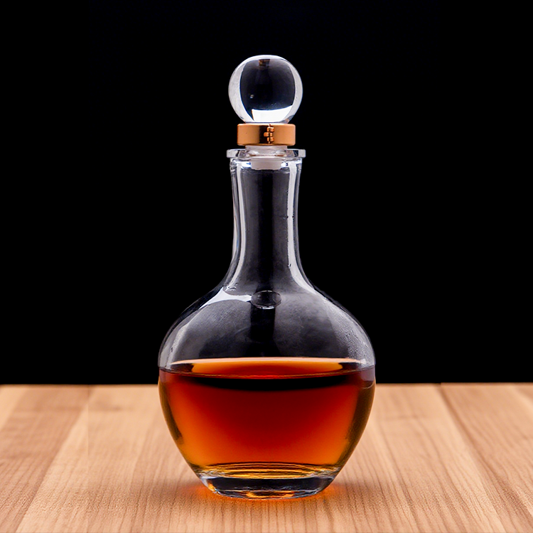 glass bottles whiskey with dispenser