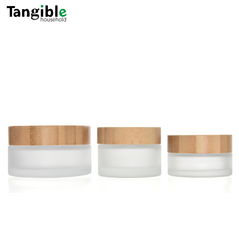 2025 Popular Frosted Glass Cream Jar With Natural Bamboo Lid 30ml Volume for Face Cream Packaging Screw Cap Sealing Type