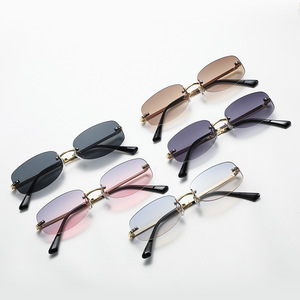 Gafas de Sol Ovaladas sin Montura Metálicas Multicolores para Mujer, Protección Solar, Diseño Simple y Elegante, Venta al Por Mayor - Product Image 1