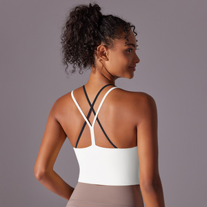 Sujetador deportivo largo transpirable para mujer al por mayor con doble tirante cruzado, top corto de yoga con almohadillas extraíbles, de Spandex/Nylon para gimnasio - Product Image 1