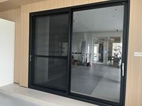 Porte coulissante verticale à double battant en aluminium insonorisée de style américain pour villa résidentielle, certifiée FSC CE