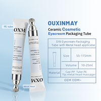 Emballage personnalisé pour crème pour les yeux en alliage métallique avec applicateur de massage en alliage de zinc, tube souple en plastique vide
