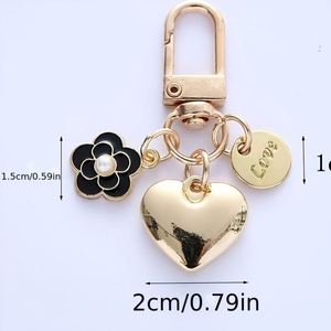 Fashionable Alloy <b>Heart</b>-<b>Shaped</b> Keychain,Cute Pearl Camellia Pendant Headphone Cover <b>Bag</b> Decoration - Product Image 4
