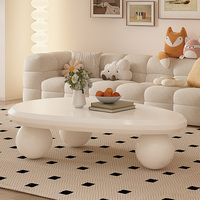 Table basse nuage crème style moderne et épuré pour salon