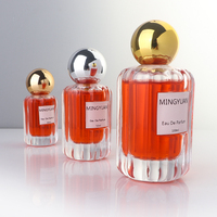 Flacon de parfum cylindrique en verre transparent de luxe 30ml 50ml 100ml à coins arrondis, grain vertical concave, pompe brillante, sérigraphie