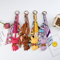 Porte-clés de luxe en cuir PU écologique avec pampille, design anime chat de créateur, breloque de sac animal, pendentif pour clés de voiture et sac à main
