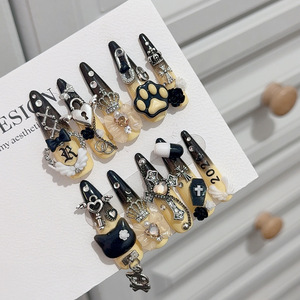 Uñas postizas Honey Butter Y2k Chic Gothic de alta resistencia con purpurina, nudo de mariposa en relieve, cruz pequeña y hechas a mano. - Product Image 1