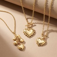 EDGE Collier minimaliste avec pendentif cœur, chaîne à fermoir à bascule, breloque cœur martelé, bijoux vintage pour femme