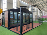 Maison conteneur modulaire extensible personnalisée de 20 pieds en panneaux sandwich, au design moderne, pour usage scolaire, salon ou extérieur