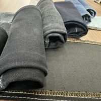 Combinaison en jean pour femme Lizhi XH6071W, tissu en jean uni extensible noir brut, fabricant de rouleaux de tissu en jean en Chine