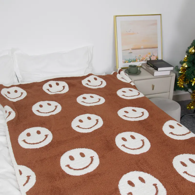 Personalizzato all'ingrosso di lusso pianura sorriso stampa grande spessa morbida maglia coperta all'uncinetto per la decorazione della casa del divano invernale