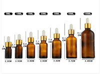 Vente en gros de flacons compte-gouttes en verre pour huiles essentielles de 5 ml à 100 ml avec couvercle en bambou, compte-gouttes doré, impression sérigraphique, couleur personnalisée