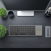 Clavier Bluetooth pliable 3 volets en plastique OEM, 64 touches, portable, fin, sans fil, avec pavé tactile pour Mac et iOS, gris sidéral