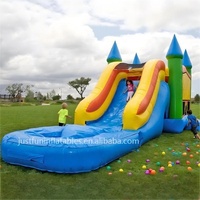 Château gonflable sautant Juego d'occasion avec toboggan aquatique à vendre