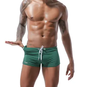 Benutzer definierte hochwertige Kordel zug Bade bekleidung Herren Aerobic Shorts mit niedriger Taille Sport Beach Shorts Jacquard Boxer Badehose Herren