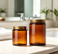 Vente en gros de pots cosmétiques en verre ambré avec couvercle en métal doré, contenants en verre vides pour bougies et crèmes, plusieurs tailles