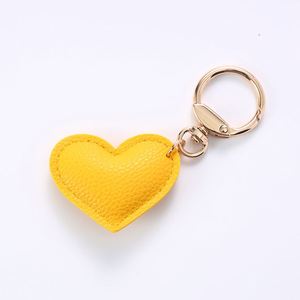 Llavero Colgante Antipérdida con Forma de Corazón, de Metal y Cuero, para Mochila y Bolso, Estilo Lindo, Adorno Colgante con Serigrafía - Product Image 4
