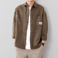 Chemise de travail décontractée tendance pour homme en tissu popeline 100% coton Printemps Automne Coupe ample Couleur unie Cardigan Anti-boulochage