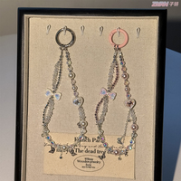 Porte-clés de luxe torsadé à double couche avec perles et breloque de sac à main en perles de cristal