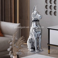 Élégante statue de chien lion en métal argenté avec accent doré Base en marbre de qualité supérieure Artisanat en résine pour villa de luxe ou espace commercial