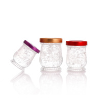Nouveau modèle OEM Pot à confiture de miel Bocal en verre pour le stockage des aliments Préserver le miel Bocal en verre de 50 ml 75 ml 100 ml avec couvercles