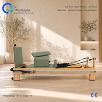 Reformer de Pilates en bois de chêne vert sauge avec barre de repose-pieds réglable pour studios de bien-être inspirés de la nature