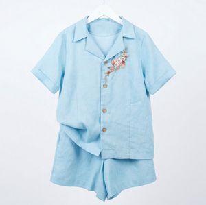 Elegante conjunto de pijama bordado en azul claro para mujer, ropa de dormir de lino suave con detalles florales, camisa con botones y pantalones cortos - Product Image 6