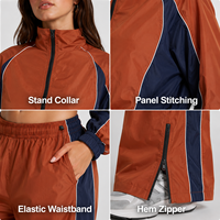 Ensemble coupe-vent en gros avec pantalon large contrastant orange et bleu marine à fermeture éclair, faible MOQ, ensemble coupe-vent court