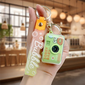 Mini caméra <span class=keywords><strong>anime</strong></span> mignonne, personnage de dessin animé à bouche de saucisse, impression UV, porte-clés avec lumière et son - Product Image 1