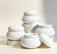 Nouveau design, pot cosmétique vide en plastique PET 200g, couleur blanche, style galet mignon, imitation céramique, pour crème visage et yeux