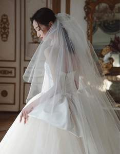 Robe de mariée <span class=keywords><strong>bustier</strong></span> personnalisée en gros, nouvelle collection, style simple Qi Di, fin, style Hepburn, coréen, nœud, <span class=keywords><strong>voile</strong></span> léger français - Product Image 2