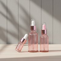 Flacons compte-gouttes, pompe et vaporisateur en verre transparent rose pour huiles essentielles et parfums