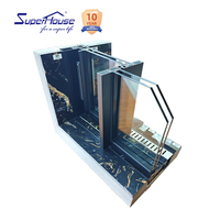 Porte coulissante en verre noir minimaliste à rail dissimulé, ultra-mince en aluminium, avec drainage linéaire au sol et double vitrage en verre trempé