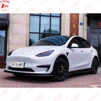 Kit carrosserie Z-ART noir brillant pour Tesla Model Y : Lame avant + Lame arrière, Aileron avant + Jupes latérales, Kit diffuseur