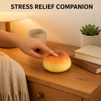 Jouet Squishy en forme de pain rond à remontée lente, garniture au sésame noir, anti-stress, compagnon de bureau