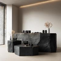 Bureau de réception incurvé moderne au fini pierre artificielle en fibre de verre noire Design extensible pour les salons de beauté, les bars, les entreprises et les hôtels