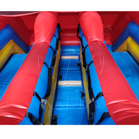 Jeux gonflables de glissière de chien commercial de patte de matériaux amicaux de PVC pour les doubles glissières sautantes gonflables combinées de château d'enfants