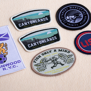 Chất Lượng Cao Tùy Chỉnh Thiết Kế Sắt Các Bản Vá Lỗi Lá Chắn Hình Dạng Thêu Dệt Nhãn Với Phim Hoạt Hình Chữ Laser Cắt Cạnh - Product Image 3