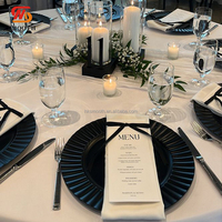 Assiette de présentation ronde en verre transparent à bord noir de 13 pouces pour la décoration de tables de mariage, de restaurants et de traiteurs en gros