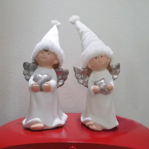 wholesale custom handmade ceramic angel with heart statue home decor Christmas girl holding book star for Christmas gift