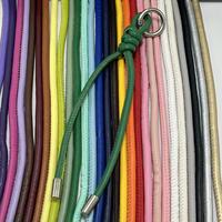 Porte-clés en cuir PU tressé avec breloques personnages, accessoires polyvalents pour sacs et boîtes, décorations pour femmes