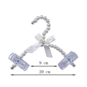 גבוהה באיכות מכירה לוהטת פרל לחיות מחמד קולב בגדי קולב פנינת תינוק בגדי קולב - Product Image 1
