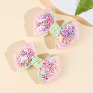 CN ริบบิ้นผ้ากรอสเกรน2ชิ้นโบว์ติดผมสีพาส<span class=keywords><strong>เท</strong></span><span class=keywords><strong>ล</strong></span>โบว์สีทึบพร้อมกลิตเตอร์ค<span class=keywords><strong>ล</strong></span>ิปหนีบ<span class=keywords><strong>ผม</strong></span>เด็กผู้หญิง - Product Image 4